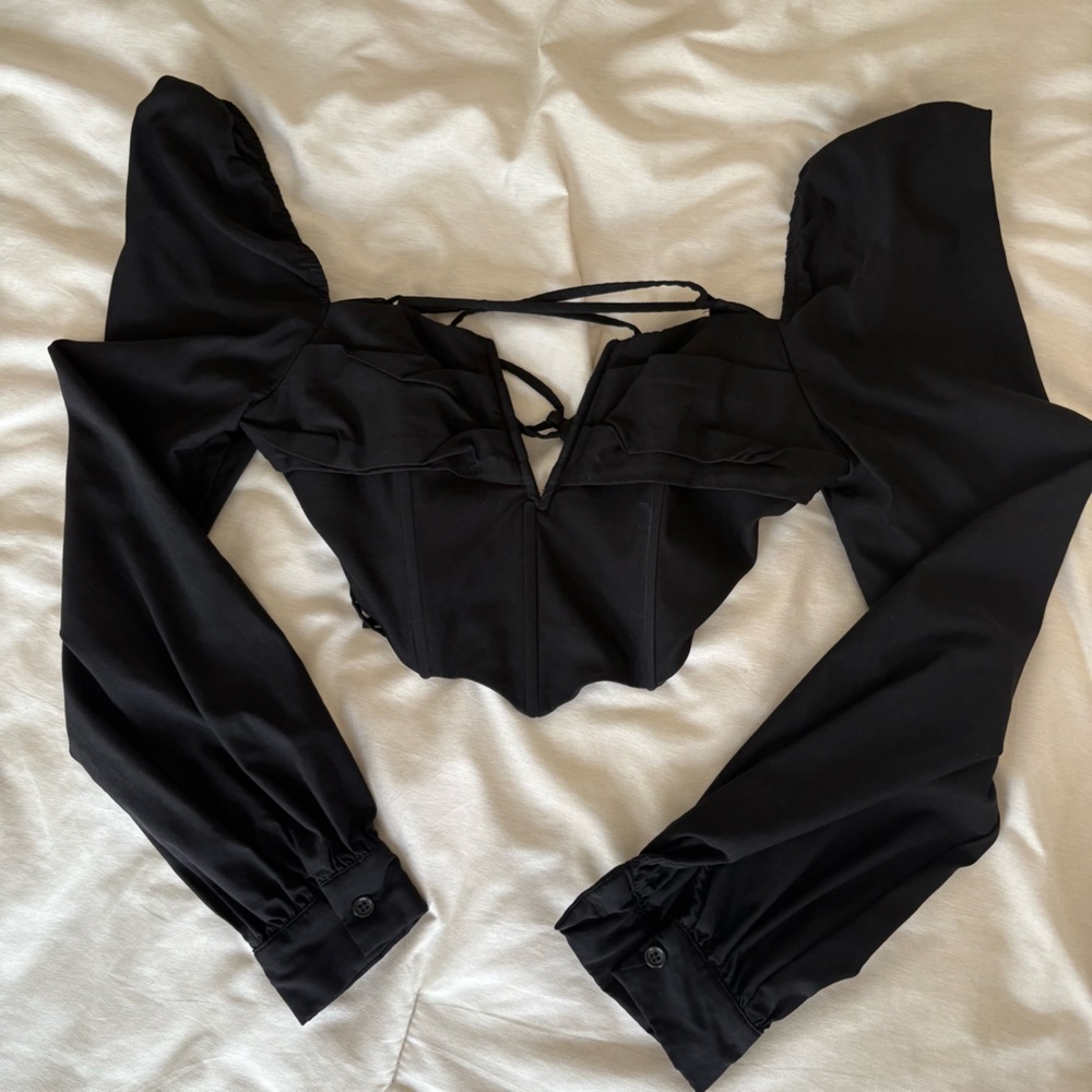 Black going out top